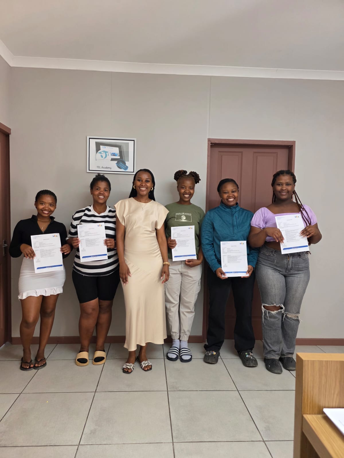 TEL Academy Students with Certificates